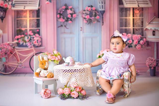 Mahveen at a pink garden tea party
